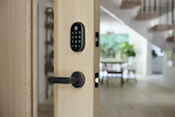 A smart door lock makes it easy for you to let pet-sitters in as well as know that they've been there.