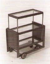 A Rudolph Schindler tea cart from the 1930s, constructed of wood, glass, metal,&nbsp;and rubber, and measuring 32 1/4" x 28" x 17 1/2", is among the items taken from the Freeman collection.