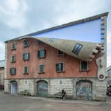 British Artist Alex Chinneck Unzips a Building in Milan