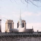 David Deroo, a French architect and artist, envisions a modernized version of the cathedral's original spire.  Photo 8 of 8 in 8 New Spire Designs That Could Crown the Notre Dame Cathedral