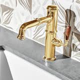 The Canteen One Hole High Profile Kitchen Faucet with Pull-Out Spray and Oak Lever Handle&nbsp;from Waterworks starts at $3,960&nbsp;