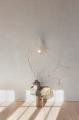 Workstead's Canopy Sconce ($1,450) casts a canopy of diffused, reflected light. 