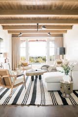 A Pampa rug from Argentina adorns this light-filled living room designed by Cortney Bishop.