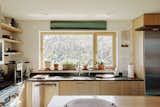 A Space Theory kitchen is installed in this Block Island prefab designed by GOLogic.