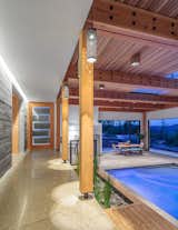 Hallway and Concrete Floor Indoor Pool  Photo 2 of 8 in Timberidge by 2fORM Architecture