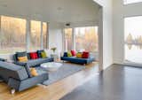 The living room alcove feels immersed in the native vegetation and acts as a retreat from the home's more open spaces.