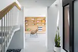The lower level’s large-scale terrazzo tiles seamlessly join the living room, dining room and kitchen. 