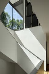Staircase, Wood Railing, and Wood Tread  Photo 12 of 20 in Royal II by William / Kaven Architecture