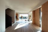 Living Room, Medium Hardwood Floor, and Sofa  Photo 3 of 17 in house VA by Didonè Comacchio