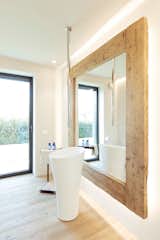 Bath Room, Ceiling Lighting, and Medium Hardwood Floor  Photo 16 of 17 in house VA by Didonè Comacchio