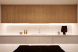 Kitchen, Ceiling Lighting, White Cabinet, Stone Tile Backsplashe, and Refrigerator kitchen detail  Photo 7 of 15 in Restyling LA by Didonè Comacchio