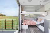 Bedroom and Bunks Simply pull down the top bunk from the ceiling and unfold the bottom bunk from the banquette.   Search “bedroomfurniture--bunks” from A Well-Traveled Couple Launch a Line of Sleek Homes on Wheels