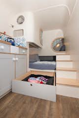 Storage for ski equipment and clothing was built under the main bed.