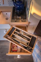 While building the cabinetry, Richens also created a silverware box for the kitchen. "It was a bit of a flight of fancy, but once you're down the rabbit hole you may as well keep going,