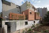 Indoor Gardens Bring Light and Air Into This Brick Home in Vietnam