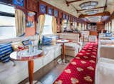With a bar and baby grand piano, The Golden Eagle's lounge is where most of the socializing happens on board.  Photo 4 of 8 in 7 of the Most Amazing Sleeper Trains Around the World