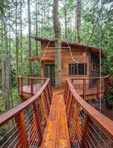 The Nelson family built a contemporary cabin with a bridge off the coast of Seattle on one of the San Juan Islands.
