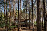 Exterior, Small Home Building Type, Flat RoofLine, Wood Siding Material, and Cabin Building Type  Photo 1 of 5 in Minimalist by neal beard from These Mirrored Forest Cottages in Ukraine Reflect the Great Outdoors