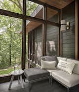 A large screened porch makes alfresco entertaining easy.