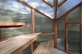 Although the pint-sized sauna has a footprint of 62 square feet, tiered benches maximize space.