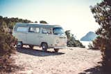 Explore Ibiza's picturesque coast while holed up in one of these classic VW camper vans.