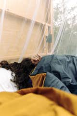 Netting over the bed protects campers from bugs if they choose to leave the cabin’s doors open while sleeping.