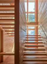 The home’s windows are strategically placed to provide ventilation and minimize heat gain/loss.