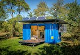 This eco-friendly escape is powered by solar panels and a wind turbine—and it even includes a full bath.