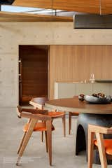 The kitchen features a warm, neutral color palette, similar to its dessert surroundings.