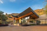 Exterior, Shed RoofLine, Metal Siding Material, House Building Type, Butterfly RoofLine, Flat RoofLine, Stucco Siding Material, Wood Siding Material, and Glass Siding Material view upon approach   Photo 4 of 19 in Cholla Vista by Brent Kendle / Kendle Design Collaborative