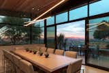 the dining room opens to outdoor terrace and valley view