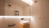 Bath Room, Pedestal Sink, Wall Lighting, Subway Tile Wall, and Open Shower Bathroom mirror  Photo 13 of 14 in DEL SIGNO APARTMENT by Fallone Studio