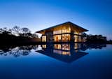 Infinity Pools, Tubs, Shower, House Building Type, Concrete Siding Material, Metal Siding Material, Metal Roof Material, Metal, Sliding Window Type, and Outdoor  Photo 1 of 6 in One Grove by TOBIN DOUGHERTY ARCHITECTS