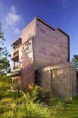 Exterior, House Building Type, Metal Roof Material, Metal Siding Material, Curved RoofLine, Stucco Siding Material, and Flat RoofLine Exterior view at Guest House by Miró Rivera Architects  Photo 3 of 12 in Guest House by Miró Rivera Architects