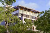 Exterior, Metal Siding Material, Flat RoofLine, House Building Type, Metal Roof Material, and Curved RoofLine Jalousie windows at Guest House by Miró Rivera Architects  Photo 5 of 12 in Guest House by Miró Rivera Architects