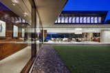 Courtyard and hallway at Residence 1446 by Miró Rivera Architects