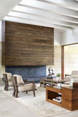 Living area and fireplace at Residence 1446 by Miró Rivera Architects