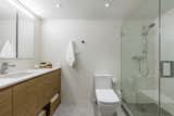 modern , vanity custom designed by nathalie milazzo , Frameless shower glass , shower system by Hansgrohe 