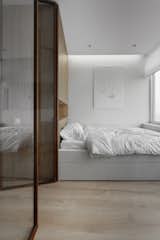 Bedroom, Wardrobe, Light Hardwood Floor, Bed, and Ceiling Lighting  Photo 5 of 17 in 191 Apt. by M3 Architects