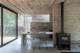 Dining Room, Table, Chair, Concrete Floor, and Pendant Lighting Casa H3.  Photo 8 of 40 in 10 Best Architects to Follow on Instagram Right Now
