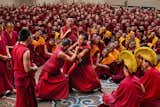 Tibetan monks debate at Sakya Monastery in Bylakuppe, India, 2001.