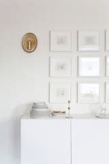 Dining Room, Wall Lighting, and Storage "My new favorite piece—well, pieces really—is my beautiful grid wall in my dining room,  Photos from My House: Visual Strategist Kate Davison’s Chic Bay Area Abode