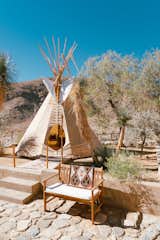 “The teepee is 26’ canvas with pine lodge poles. It’s simple in construction as it was originally intended to be a nomadic dwelling. It is extremely reliable in the high desert winds and even great in the rain. We have a small fire pit in there to keep it toasty on cool winter evenings. It’s one my favorite places on the property.”