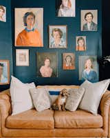 Her pup's favorite spot is the sofa under the art wall, which oozes with strong female energy.