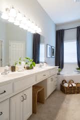 A streamlined bathroom makes getting ready easy and provides a space for Elrod to decompress.