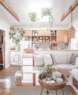 Living Room The open floor plan allows the living space to flow into the kitchen.  Photo 5 of 34 in 10 Tiny Home Dwellers You Should Follow on Instagram Right Now