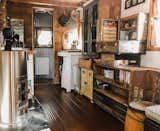 Living Room, Wood Burning Fireplace, and Dark Hardwood Floor The view from the doorway.  Photos from 10 Tiny Home Dwellers You Should Follow on Instagram Right Now
