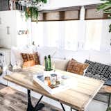 Dining Room, Table, Bench, and Medium Hardwood Floor Desert vibes in the dining area.  Photo 12 of 34 in 10 Tiny Home Dwellers You Should Follow on Instagram Right Now