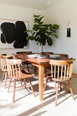 The dining room is a minimalist space with handmade Shigouri dining chairs from Guest House.