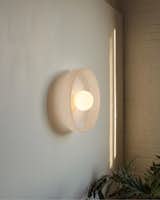 In Common With’s hand-blown glass sconce.